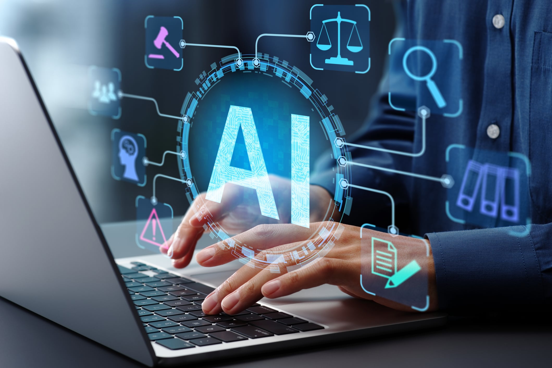 laptop with AI above it.