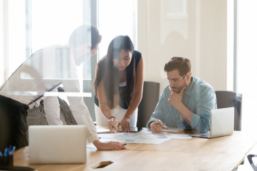 Team members discussing work matters