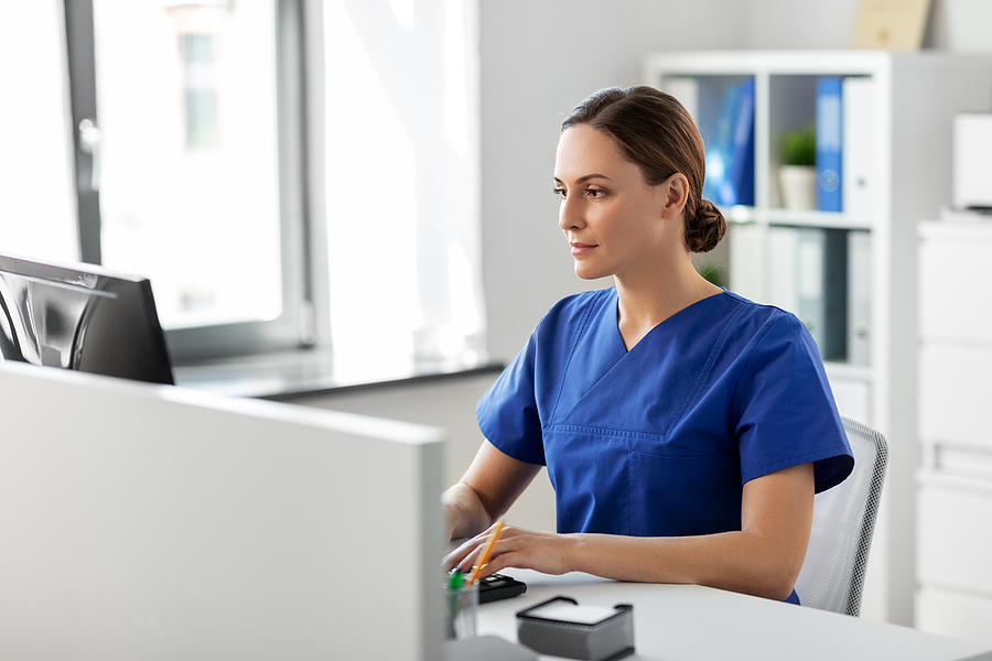 Medicine nurse on a computer
