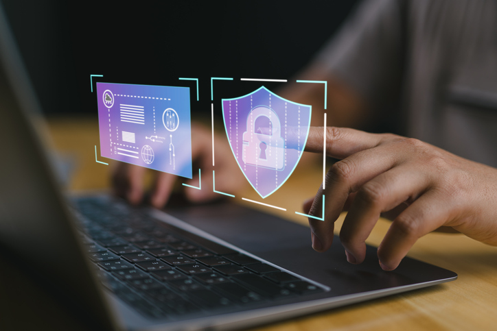 Person on laptop logging in